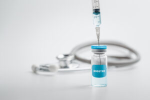 Syringe with liquid vaccines booster. fight against virus covid-19 coronavirus, Vaccination and immunization. diseases,medical care,science, vaccine booster concept.