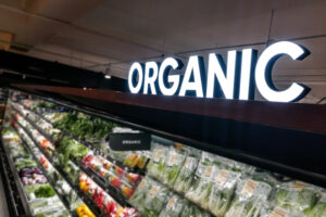 Organic produce vegetable fruits aisle with signage word in supe