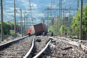 Massive freight train derailed along the tracks. Tracks, freight