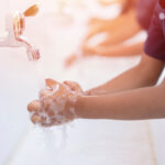 close up hands of children or Pupils At preschool Washing hands